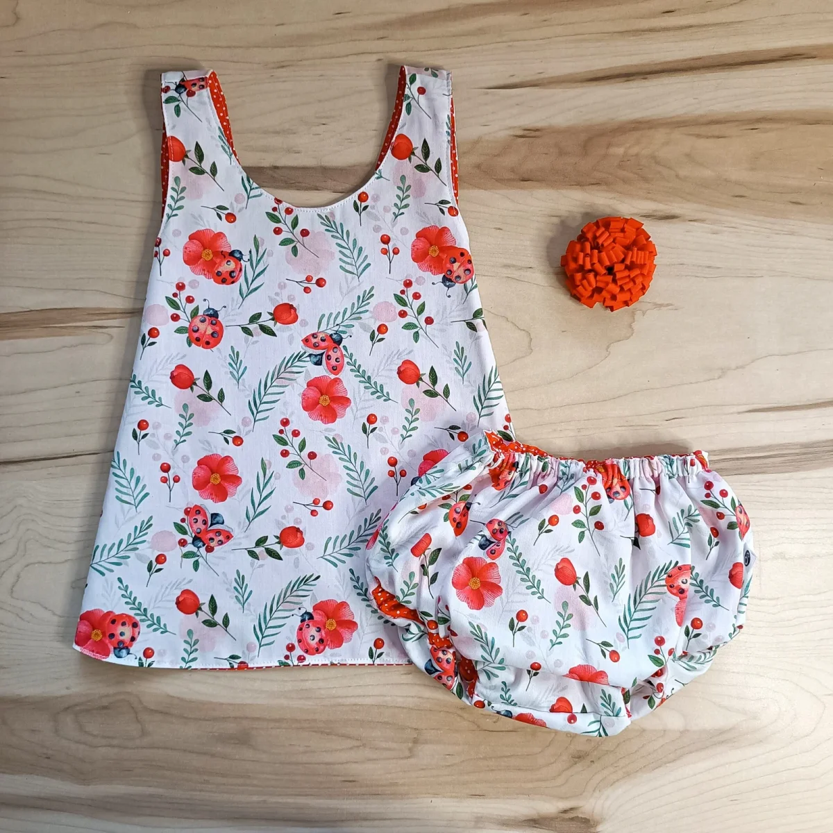 Vestido reversible flores para niñas de entre 1 y 4 años - Imagen 4