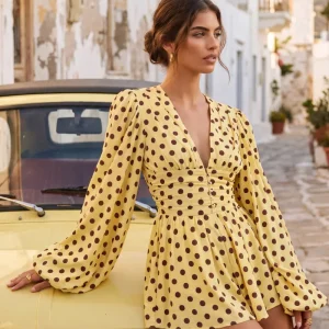 Laurel | Mono Amarillo De Lunares Con Escote En V Y Mangas Farol