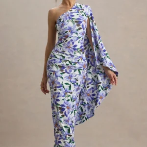 Clementina | Vestido largo con estampado de lirios y manga capa asimétrica drapeada