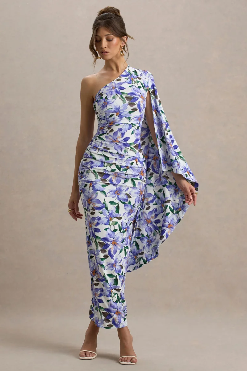Clementina | Vestido largo con estampado de lirios y manga capa asimétrica drapeada