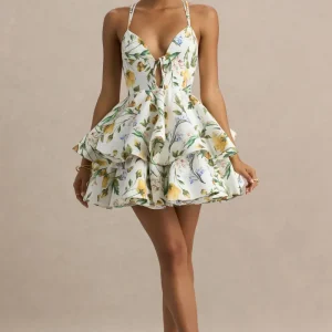 Flavia | Vestido corto con escote pronunciado y falda con volantes de estampado floral