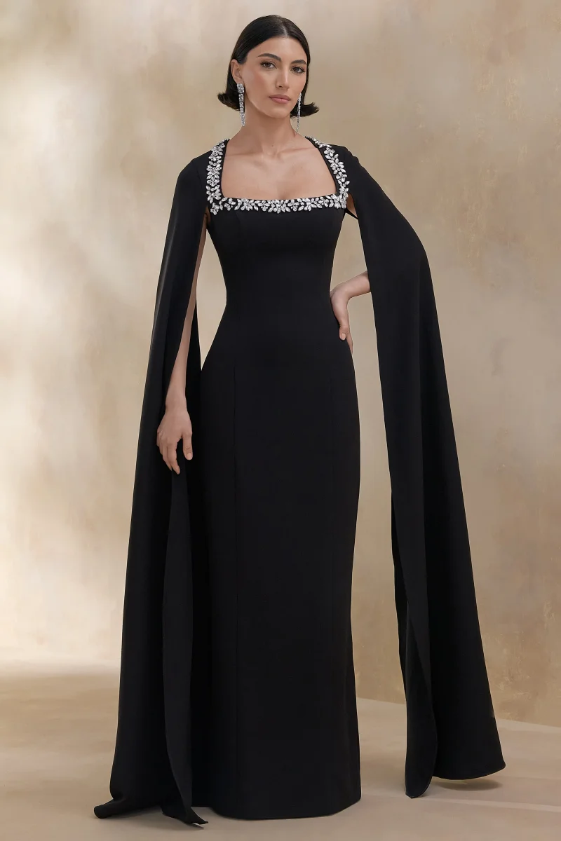 Glossy | Vestido Largo Negro con Escote Cuadrado Adornado y Mangas Capa - Imagen 5