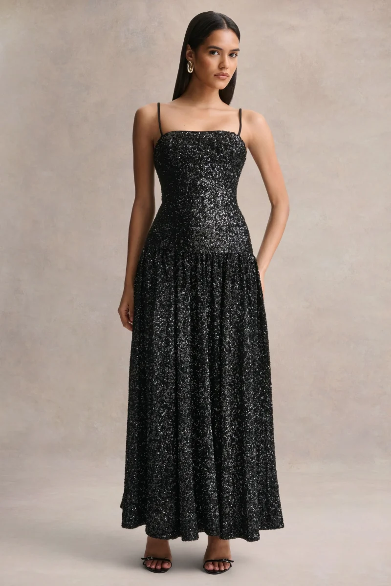 Allora | Vestido Largo negro de lentejuelas con escote bandeau y falda plisada