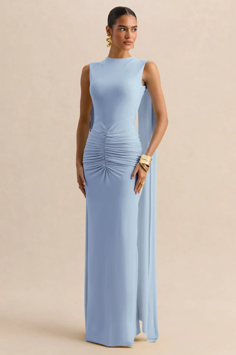 Premiere | Vestido Largo Azul Empolvado De Jersey Elástico Con Escote Barco Y Mangas Capa - Imagen 6