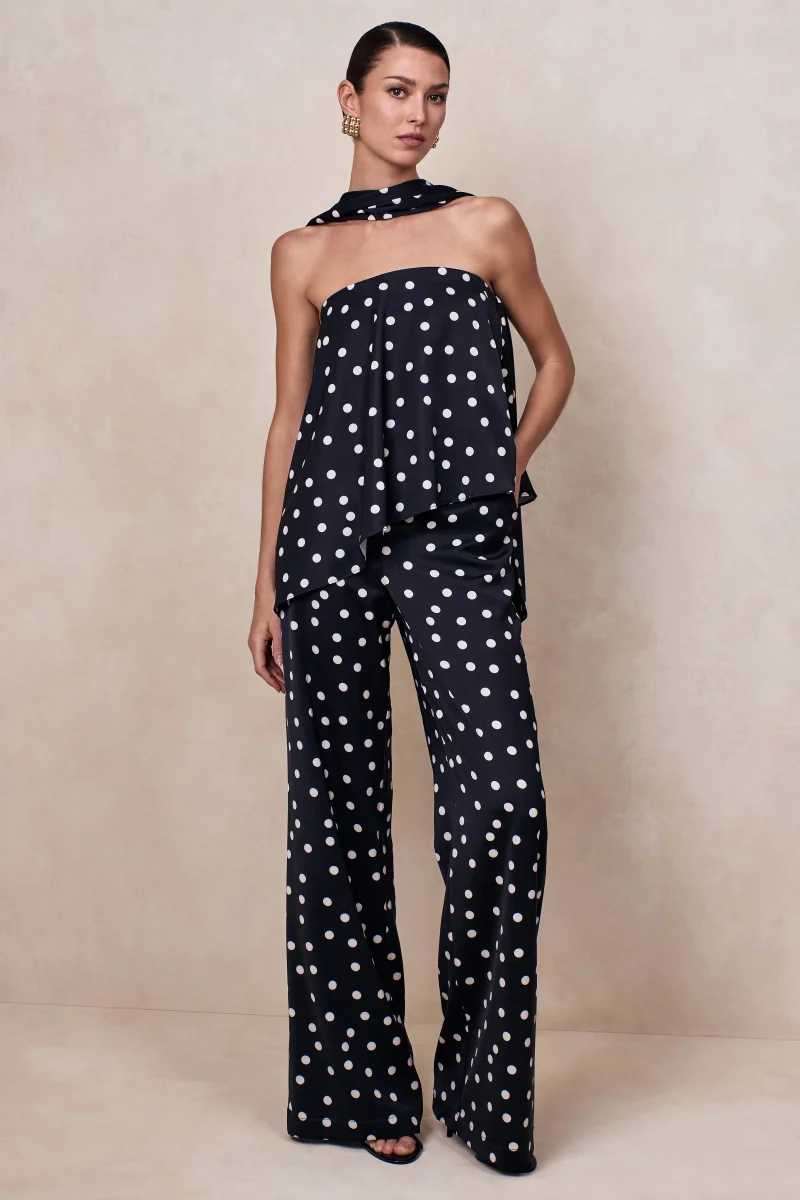 Seloria | Pantalón de pierna ancha en satén blanco y negro con estampado de lunares - Imagen 2