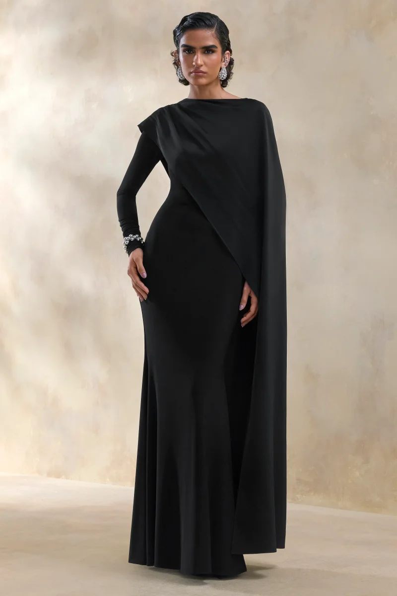 Salenne | Vestido largo de cuello redondo en color negro con capa asimétrica de satén
