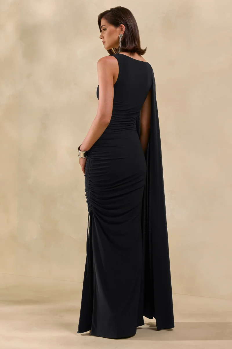 Evalette | Vestido Largo Negro De Jersey Con Cuello Asimétrico Y Manga Capa - Imagen 3