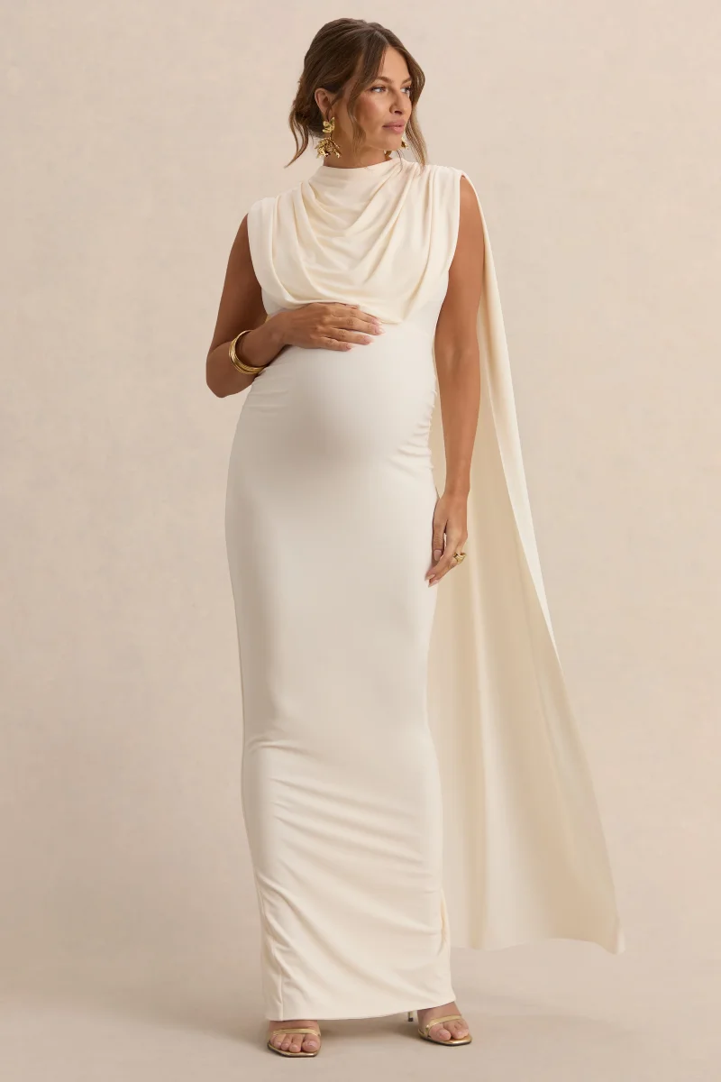 Belva | Vestido Largo Premamá Crema De Jersey Elástico Premium Con Escote Redondo Y Detalle De Capa - Imagen 7