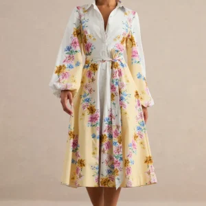 Moira | Vestido midi con estampado floral en tonos limón y mangas acampanadas