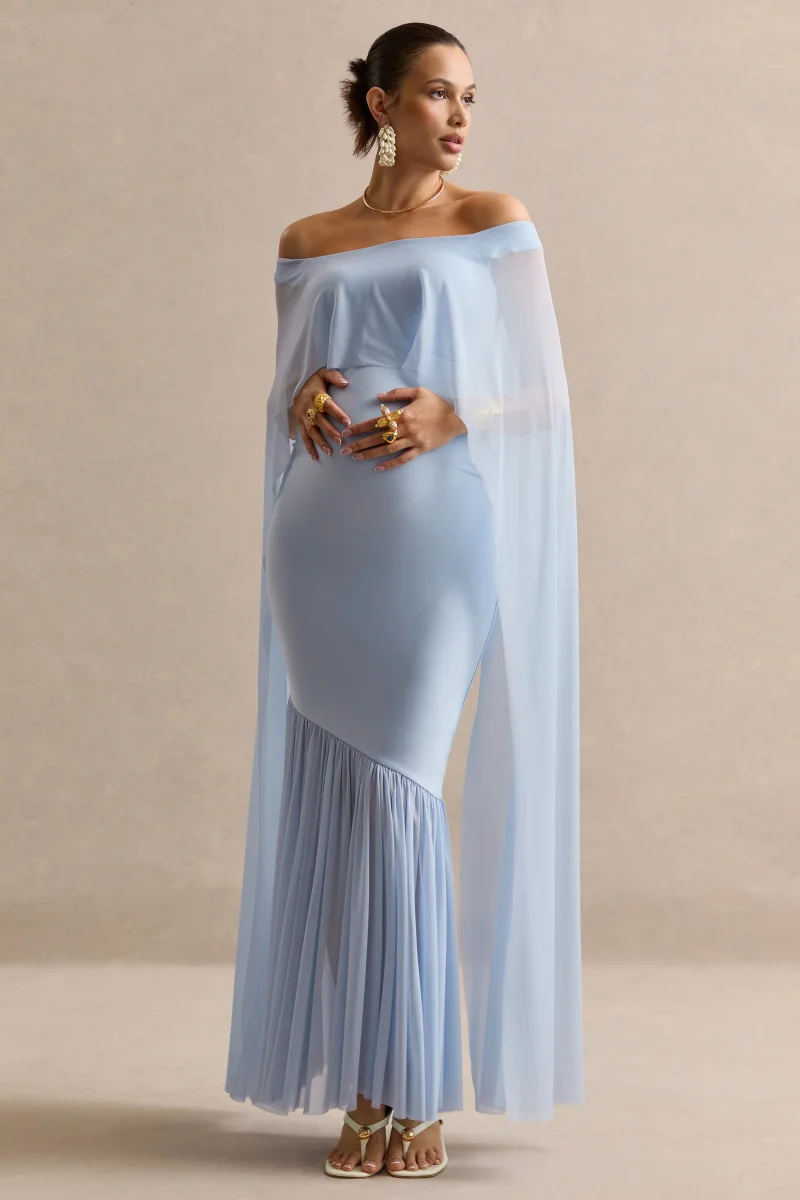 Bluma | Vestido Largo Premamá Azul Pastel Con Escote Bardot, Falda Semitransparente Y Detalle Capa - Imagen 8