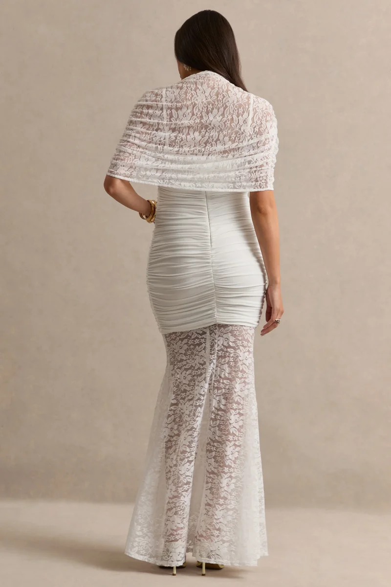 Bronta | Vestido Premamá Largo Blanco De Encaje Con Cuello Alto, Capa Corta Y Falda Transparente - Imagen 3