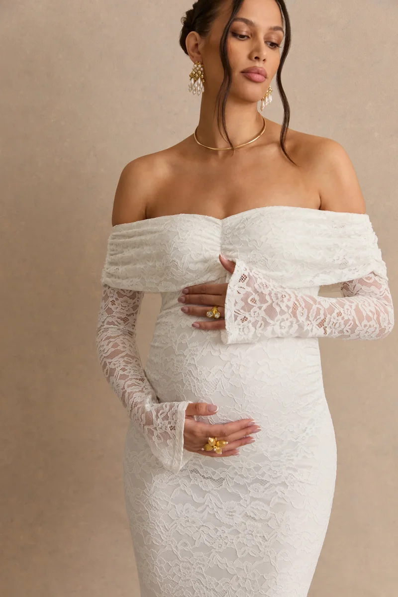 Valleria | Vestido Maxi Premamá Blanco De Encaje Con Escote Bardot Y Mangas Campana - Imagen 8