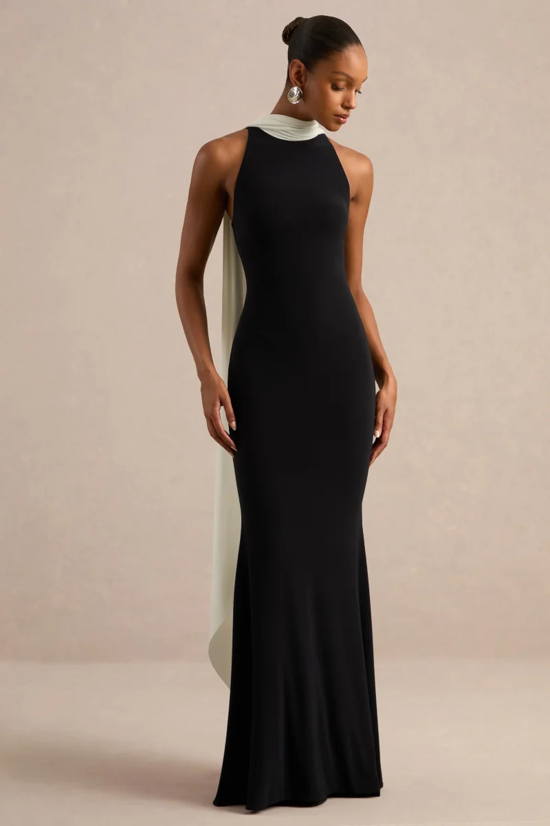 Calise | Vestido maxi en blanco y negro con cuello alto y detalle de capa - Imagen 6