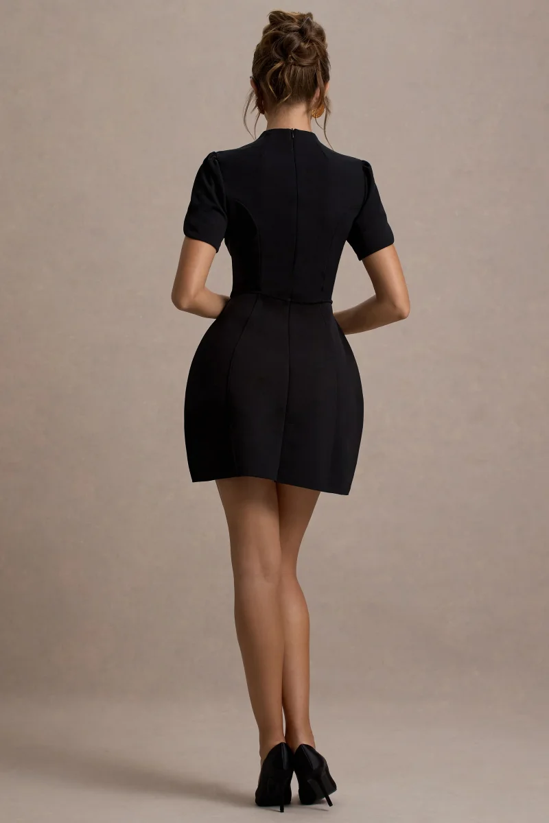 Carabella | Vestido Mini Negro Con Cuello Alto Y Mangas Cortas Abullonadas - Imagen 3