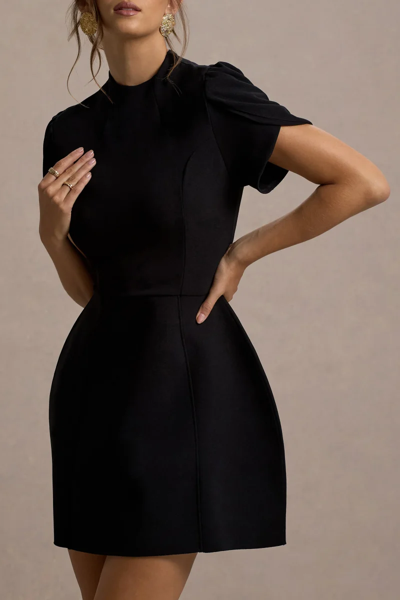 Carabella | Vestido Mini Negro Con Cuello Alto Y Mangas Cortas Abullonadas - Imagen 5
