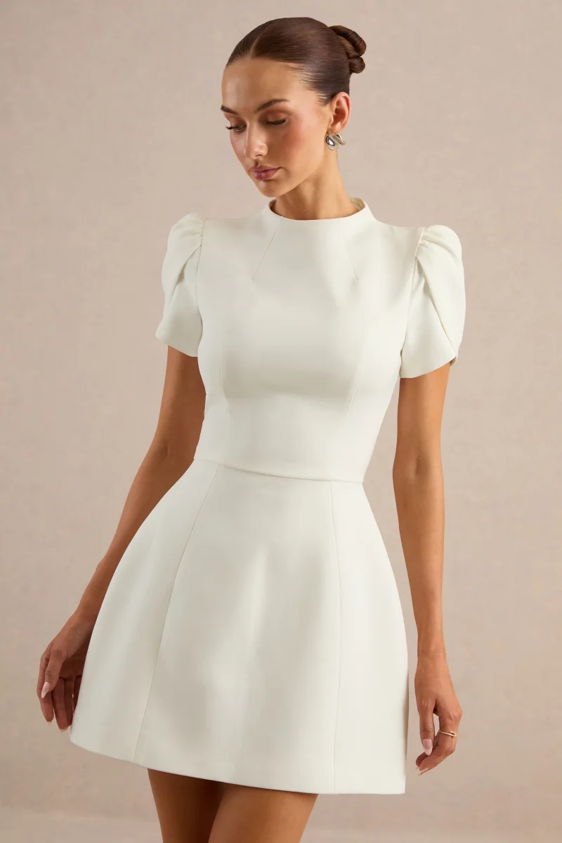 Carabella | Vestido Mini Blanco De Cuello Alto Y Manga Corta - Imagen 7