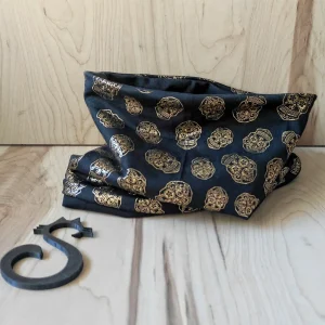 Cuello calaveras doradas