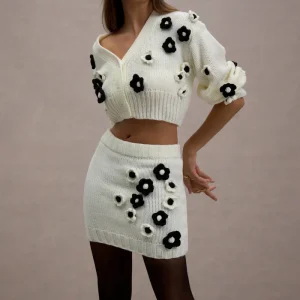 Triomphe | Falda corta de punto en color crema y detalles florales