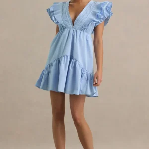 Judie | Vestido corto azul claro con detalle de volantes