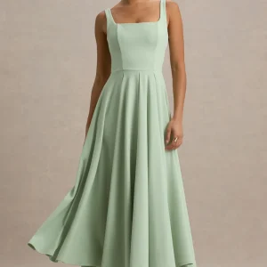 Parina | Vestido midi verde claro con escote cuadrado y falda voluminosa