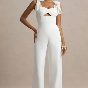 Claudelle | Mono blanco de pierna acampanada con tirantes de lazo de organza