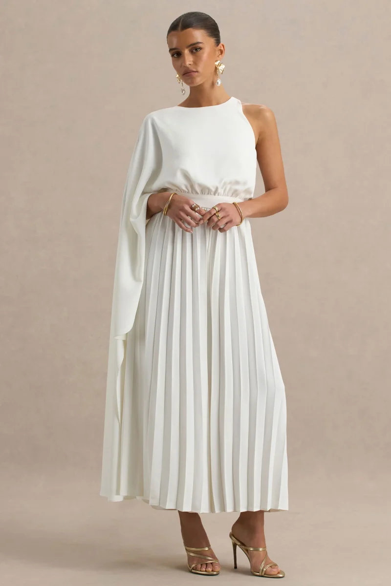 Paradise | Mono blanco con detalle de lazada en el cuello y manga tipo capa