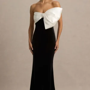 Divulge | Vestido largo de terciopelo negro y blanco con escote asimétrico y detalle de lazo