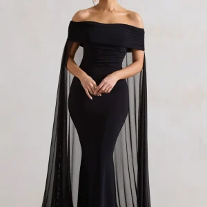 Carlotta | Vestido largo negro ajustado con capa de gasa y escote bardot