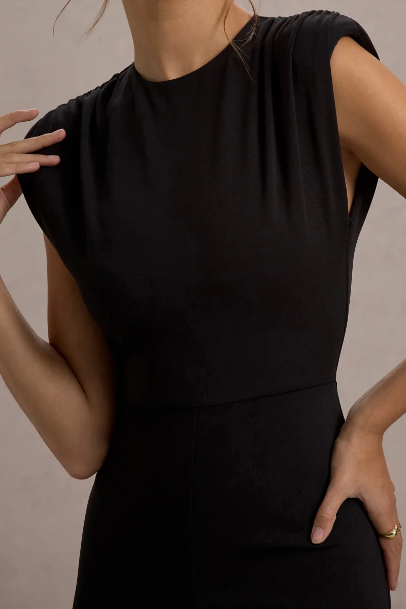 Elyna | Mono negro con hombros fruncidos y pantalones acampanados - Imagen 7