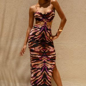 Roxana | Vestido largo con detalles dorados y estampado de cebra