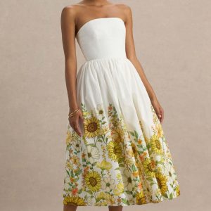 Ivory | Vestido midi asimétrico con escote bandeau y estampado de girasoles