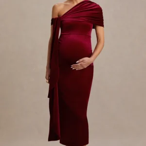 Zena | Vestido Midi Premamá de Terciopelo Burdeos con Escote Asimétrico y Detalle de Nudo y Fajín