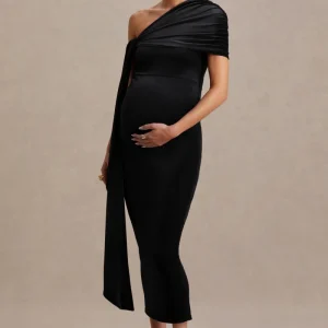 Zena | Vestido Midi Premamá de Terciopelo Negro con Escote Asimétrico y Detalle de Nudo y Fajín