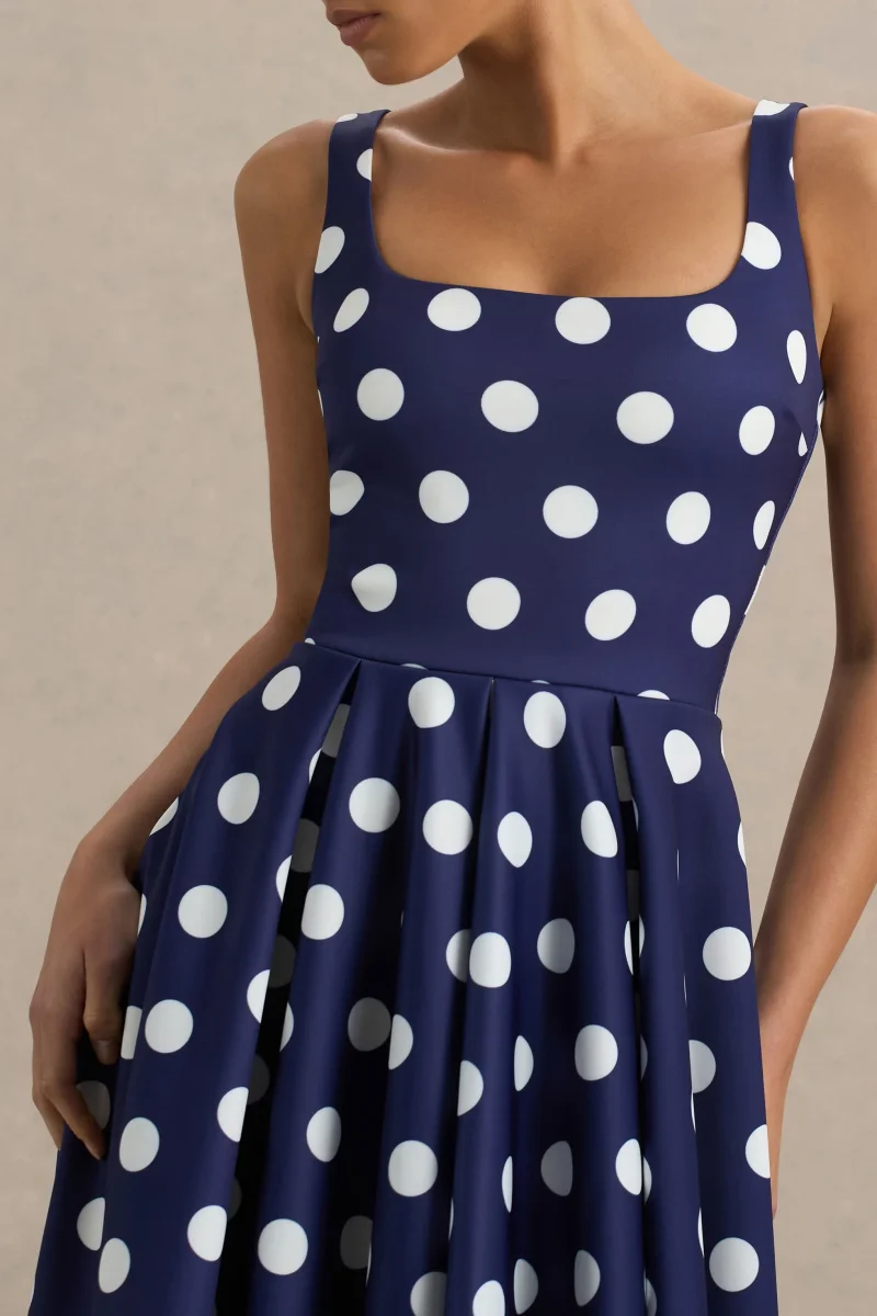Berta | Vestido midi azul marino con lunares balanco y falda con volumen - Imagen 7
