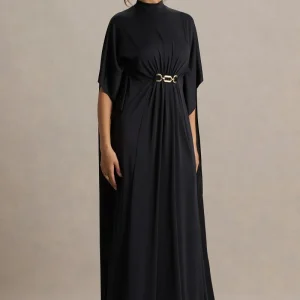 Olessia | Vestido negro con mangas tipo capa y cinturón con detalles dorados