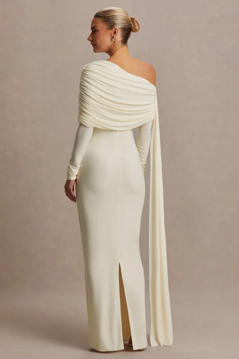 Cyra | Vestido largo crema con escote asimétrico y fajín - Imagen 3